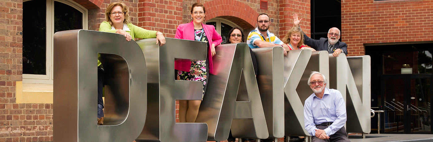 2016 SPERA Executive in front of Deakin University sign