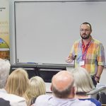 Phil Roberts standing in Front of Whiteboard